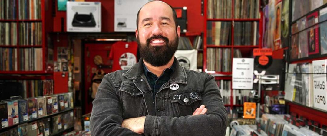 beatdisc records store owner standing in record store smiling