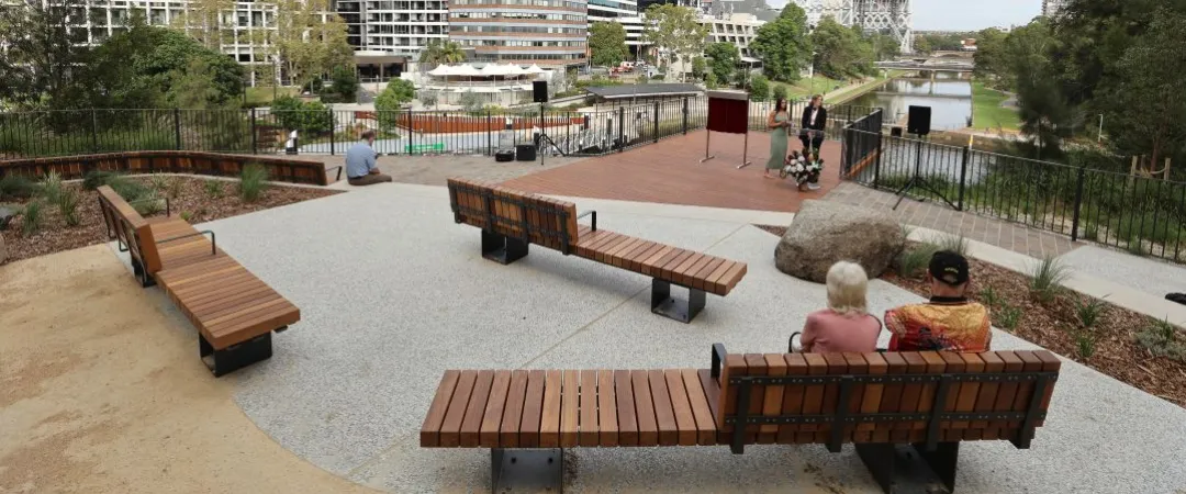 Two people sitting on bench