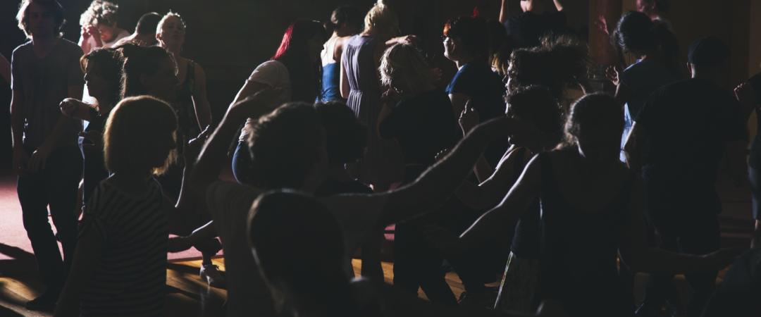 People dancing in the dark