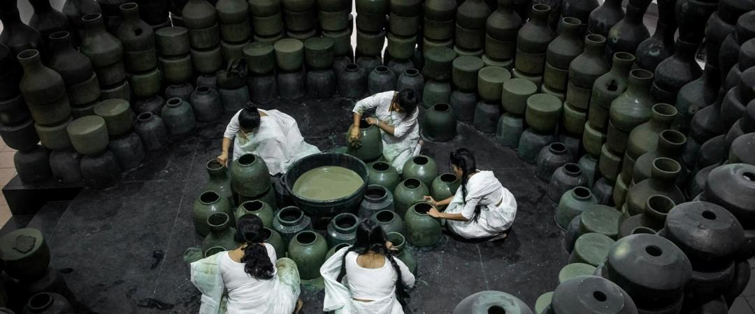 Women making pots