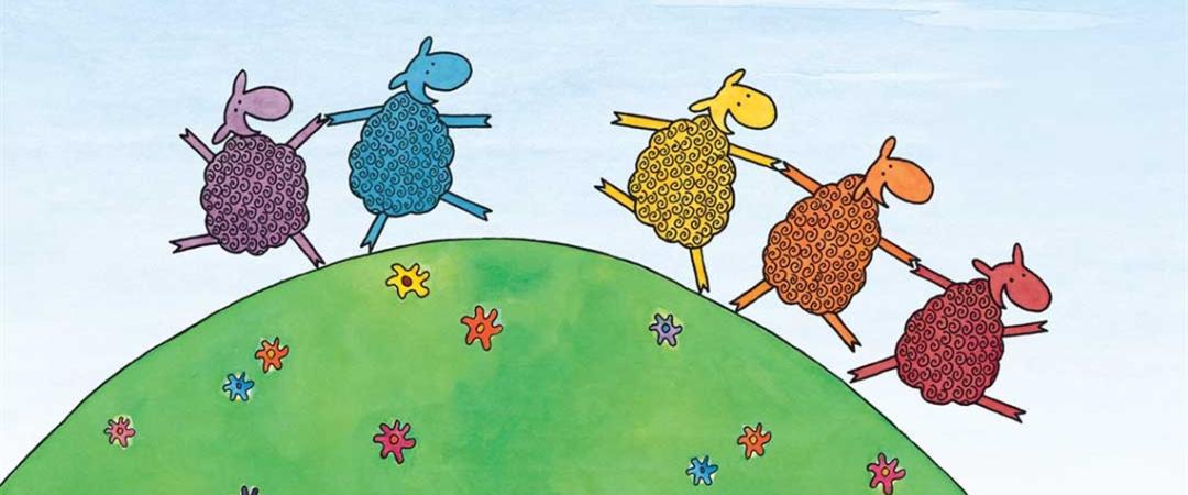  A group of sheep is running energetically up a grassy hill under a clear blue sky.