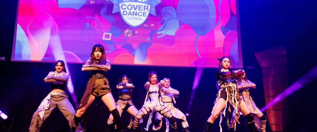 Dance group performing on stage