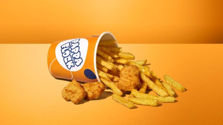 chicken and chips in a cup