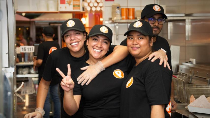 employees posing together at pappa flock